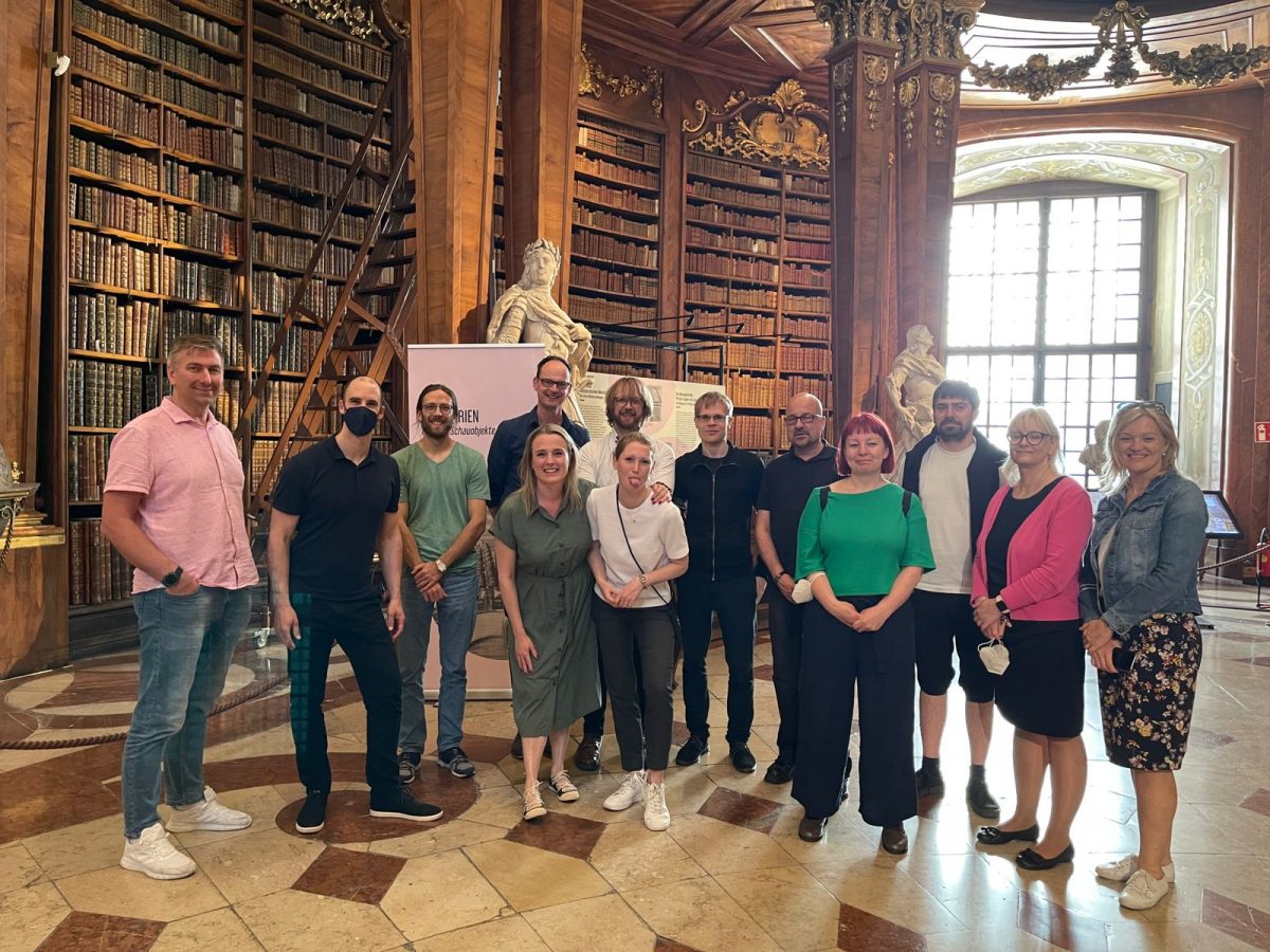 Team members in the Austrian National Library's State Hall